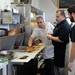 From left, Antonio Contreras, Walid Dimo and Shammas  work on an order in the kitchen Thursday, May 23, 2013. Melanie Maxwell | AnnArbor.com